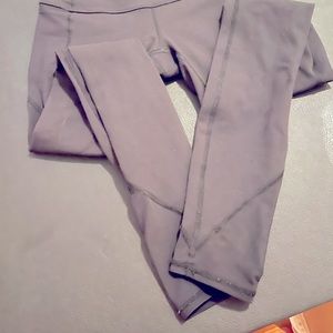 Lululemon mesh bottom black leggings. Worn no holes slight pilling. Size 4